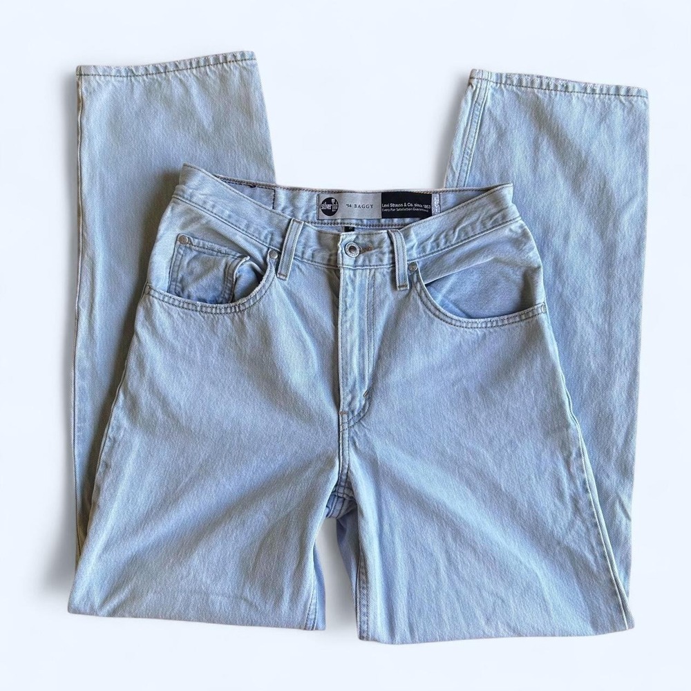 Levi's 94' baggy light wash blue jeans w distressed knee rips • size: 27 X 31